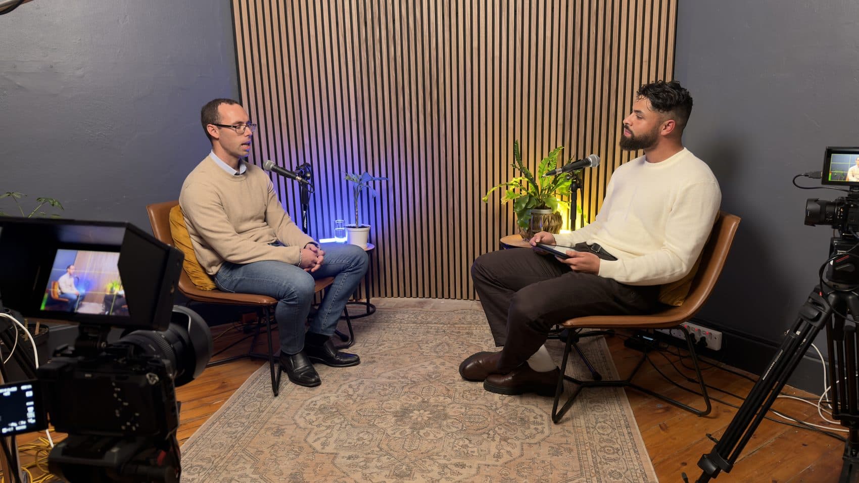 Studio interview filmed on the wood-slat set